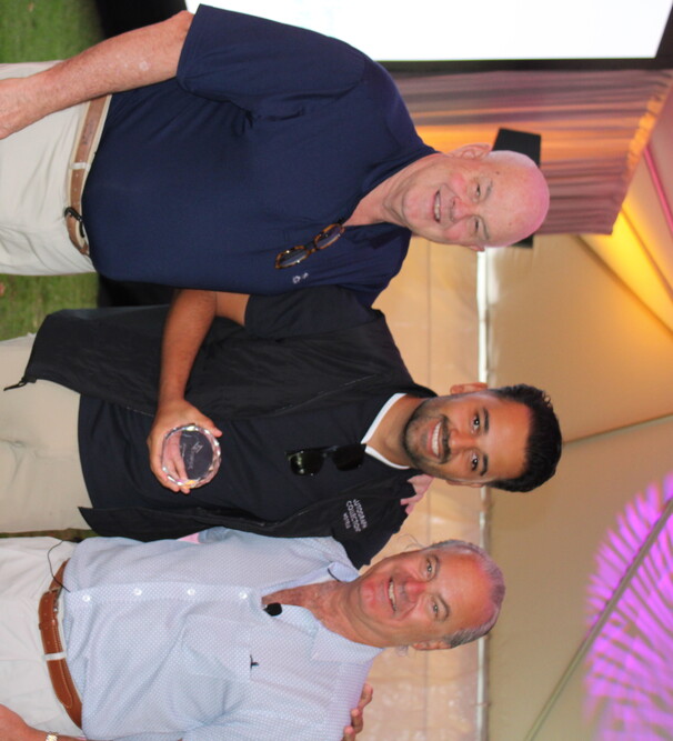 a group of men posing for a picture