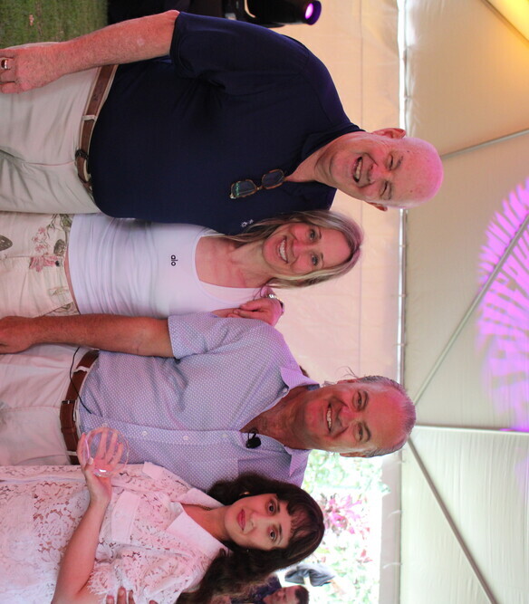 a group of people posing for a photo