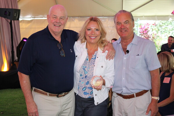 a group of people posing for a photo