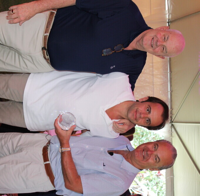 a group of men posing for a picture