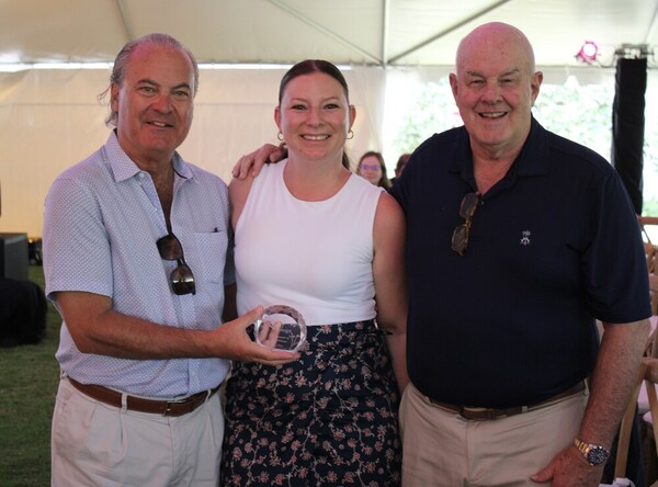 a group of people posing for a photo
