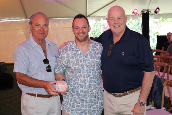 a group of men posing for a picture