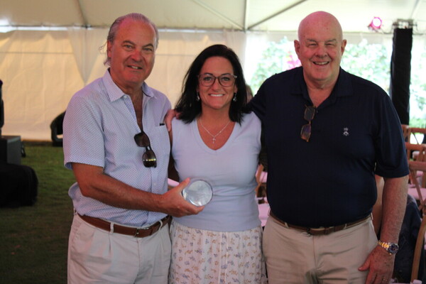 a group of people posing for a photo