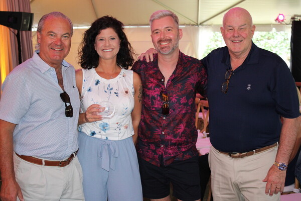 a group of people posing for a photo