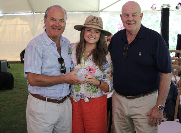 a group of people posing for a photo