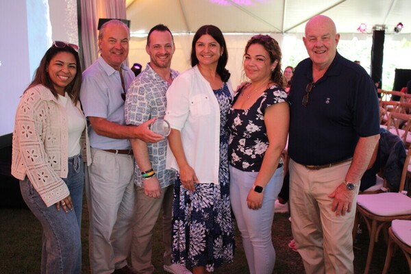a group of people posing for a photo