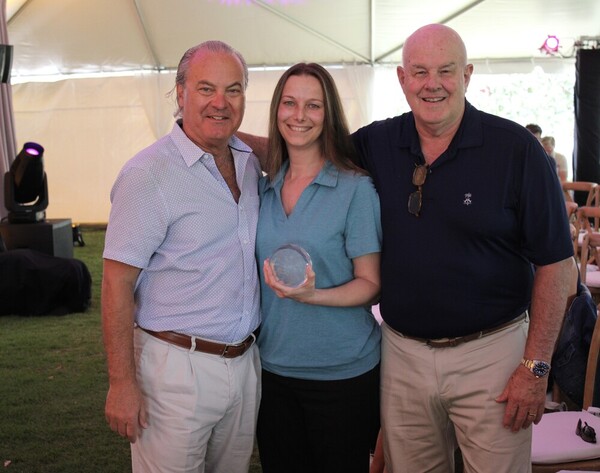 a group of people posing for a photo