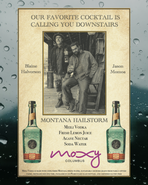 a poster of two men on a glass surface