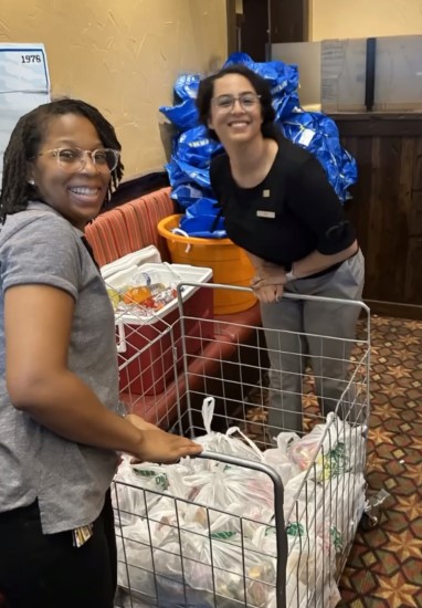 two shaner employees with donations